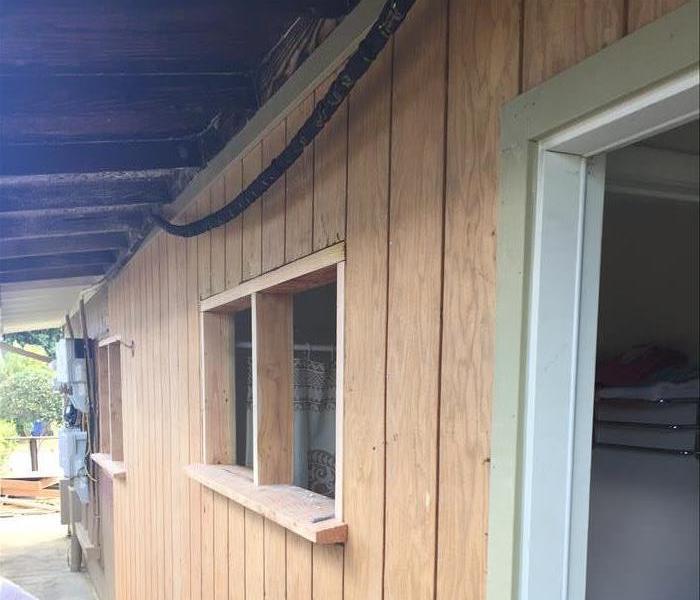 Fresh wood paneling on exterior wall