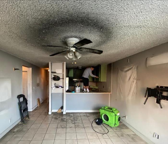 A photo of a customers home with our SERVPRO team working on the cleaning 